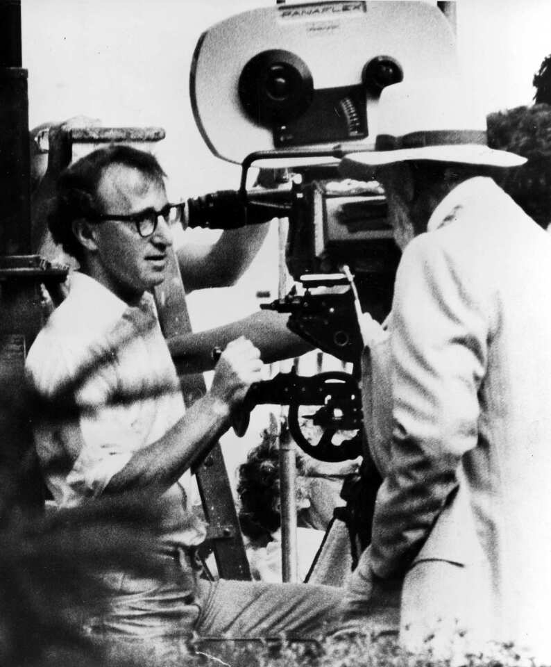 Director Woody Allen chats with Oscar-winning actor Jose Ferrer, right, during the production of his comedy "A Midsummer Night's Sex Comedy" in New York's Upper West Side on Aug. 18, 1981.