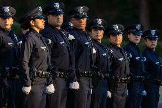 LOS ANGELES, CA - OCTOBER 20: Los Angeles Police Academy Class of 05-2023 march at a graduation ceremony at LAPD Academy on Friday, Oct. 20, 2023 in Los Angeles, CA. (Irfan Khan / Los Angeles Times)