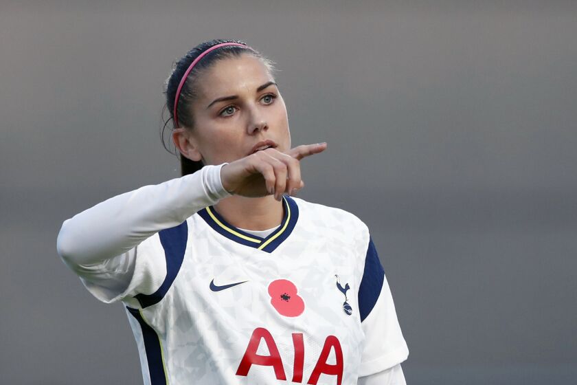Tottenham Hotspur's Alex Morgan gestures to her teammates.