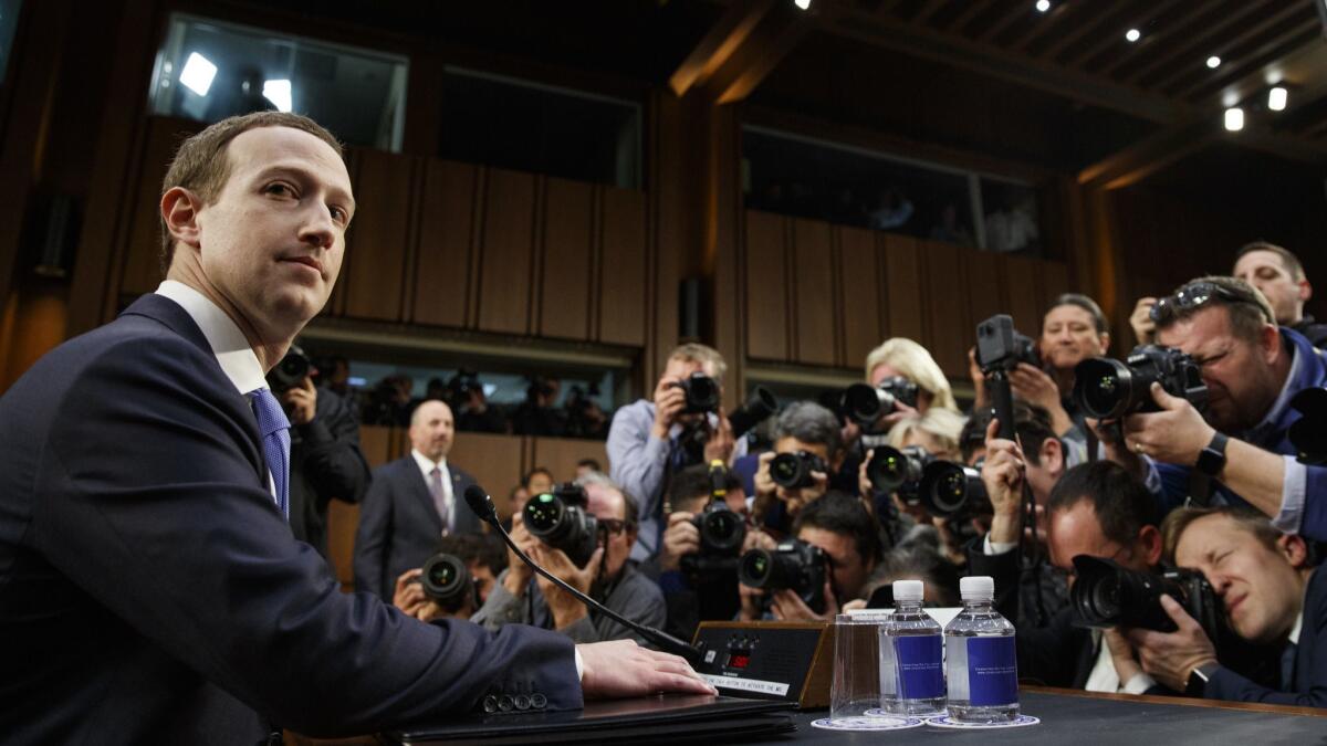 Facebook CEO Mark Zuckerberg prepares to testify before a joint hearing of the Commerce and Judiciary Committees on Capitol Hill in Washington in April about the use of Facebook data to target American voters in the 2016 election.