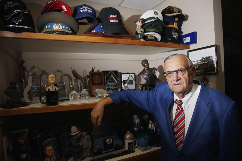 Former Maricopa County Sheriff Joe Arpaio poses for a photograph in his office as he is running for the position of Maricopa County Sheriff again, Wednesday, July 22, 2020, in Fountain Hills, Ariz. Arpaio is trying to win back the sheriff's post in metro Phoenix that he held for 24 years, in what Arpaio acknowledges could be his last political race. (AP Photo/Ross D. Franklin)