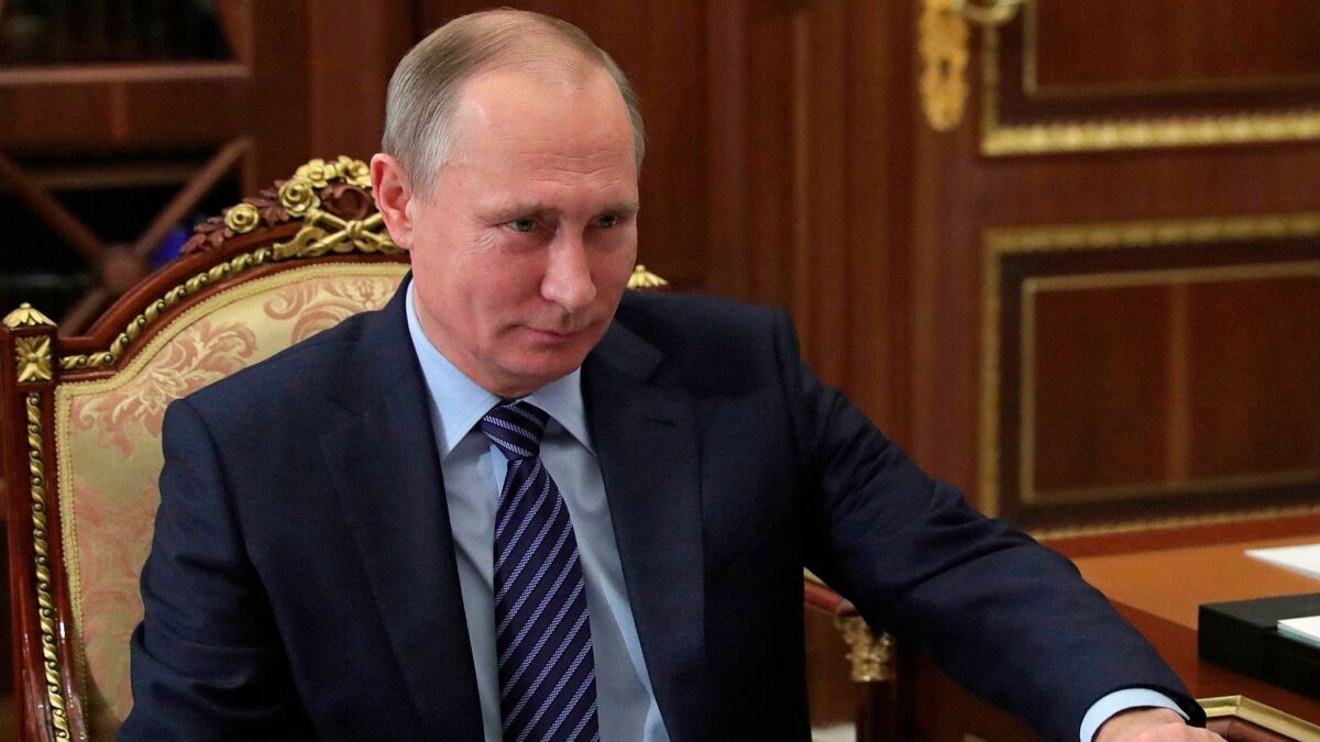 Russian President Vladimir Putin allegedly approved hacking of the U.S. presidential election. Above, Putin at a meeting in the Kremlin in Moscow on Dec. 12, 2016.