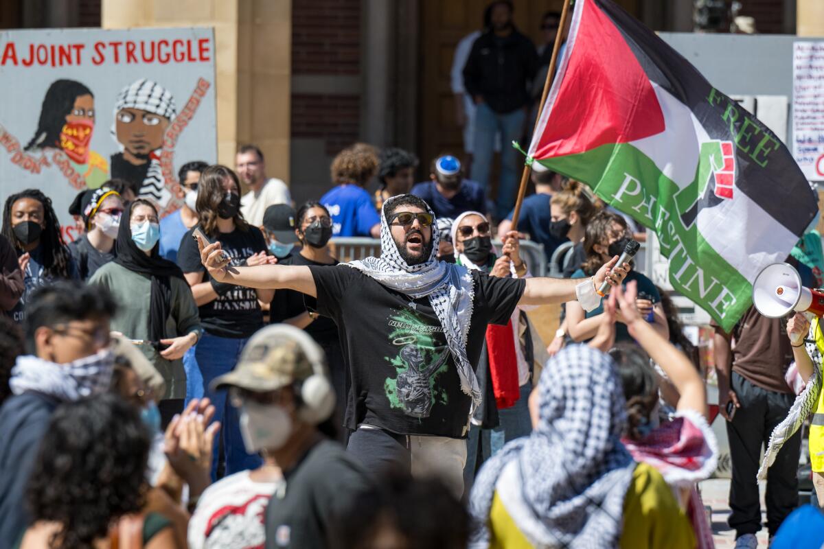 Pro-Palestinian protesters demonstrate in an encampment at UCLA.