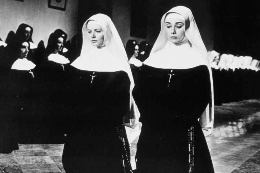 Patricia Bosworth, left, with Audrey Hepburn in the 1959 film "The Nun's Story." Bosworth went on to be a famed biographer. Her new book is a memoir.