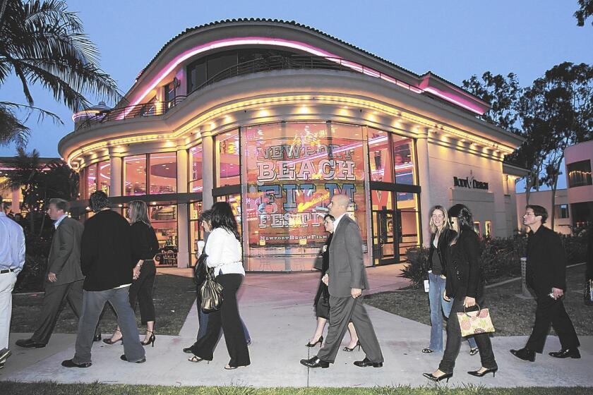 Moviegoers head to the Edwards Big Newport 6 theater during a past Newport Beach Film Festival.