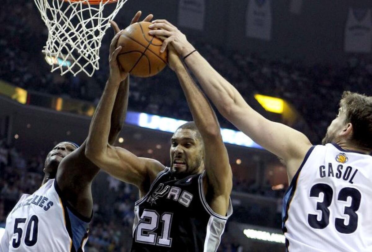 Memphis Grizzlies big men Zach Randolph (50) and Marc Gasol (33) will battle with San Antonio Spurs' Tim Duncan.