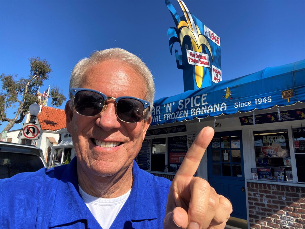 Pat Pattison outside Sugar n' Spice Balboa Island, where he filmed a segment on the shop's famous frozen bananas.