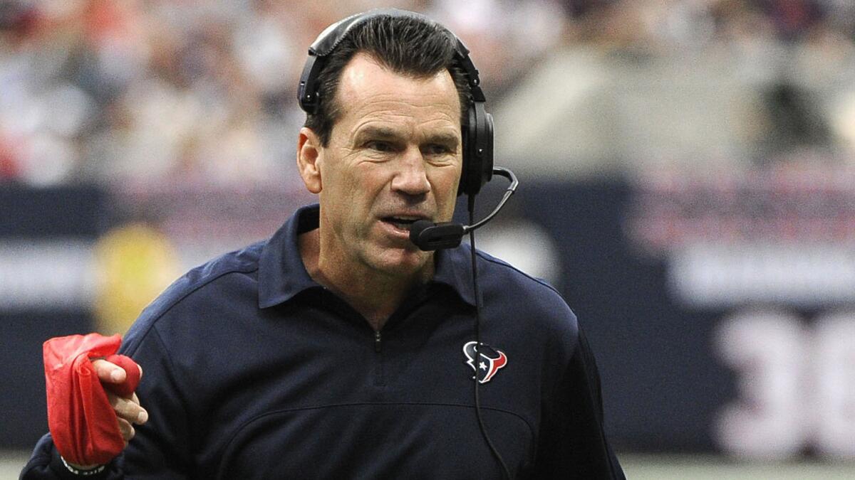 Gary Kubiak challenges a ruling on the field during the Houston Texans' game against the Tennessee Titans on Sept. 30, 2012.