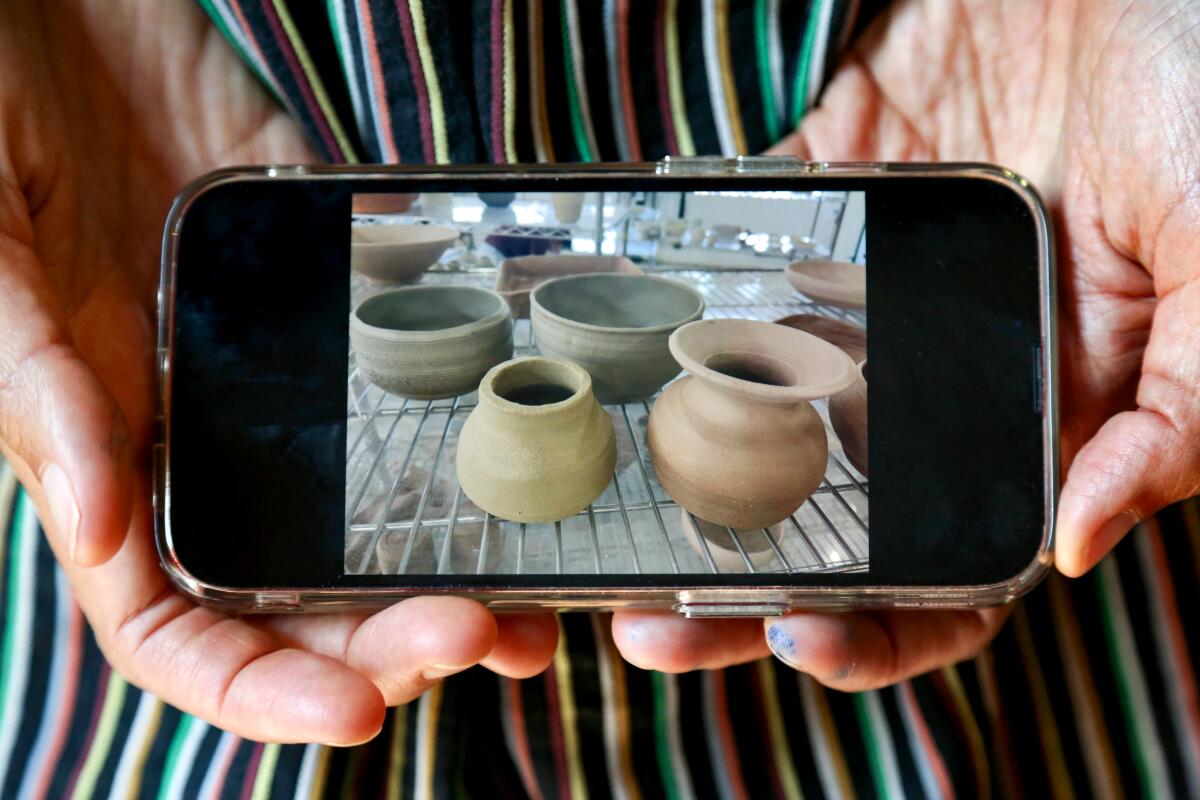 An image on a smartphone of some pottery.