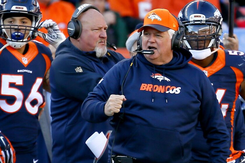 Broncos defensive coordinator Wade Phillips reacts after a play against the Raiders during a game in December.