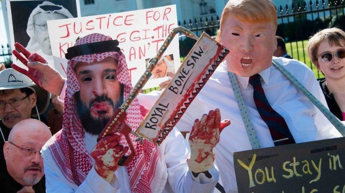 Demonstrators dressed as Saudi Arabia Crown Prince Mohammed bin Salman and President Trump protest outside the White House on Oct. 19.