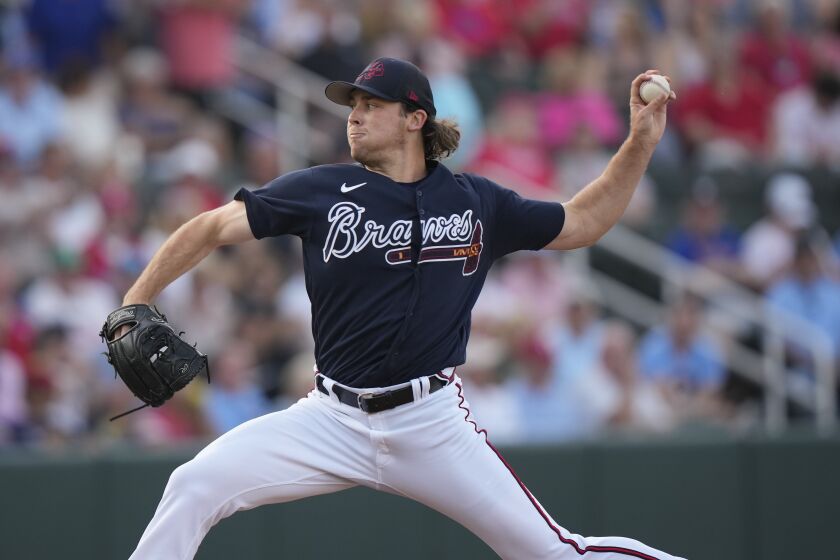 Atlanta Braves pitcher Dylan Dodd throws in the second inning of a spring training baseball game against the Philadelphia Phillies in North Port, Fla., Saturday, March 18, 2023. (AP Photo/Gerald Herbert)