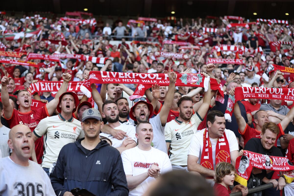 Liverpool fans cheer during the English FA Cup final soccer match between Chelsea and Liverpool, at Wembley stadium, in London, Saturday, May 14, 2022. (AP Photo/Ian Walton)