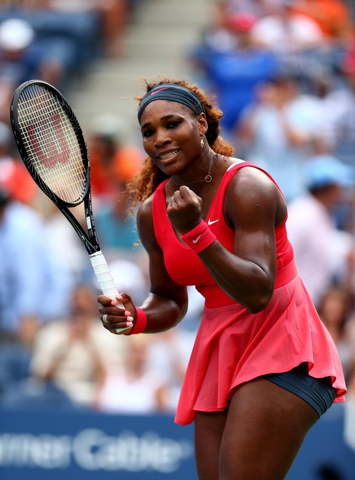 Serena Williams celebrates her fourth-round victory Sunday over Sloane Stephens at the U.S. Open