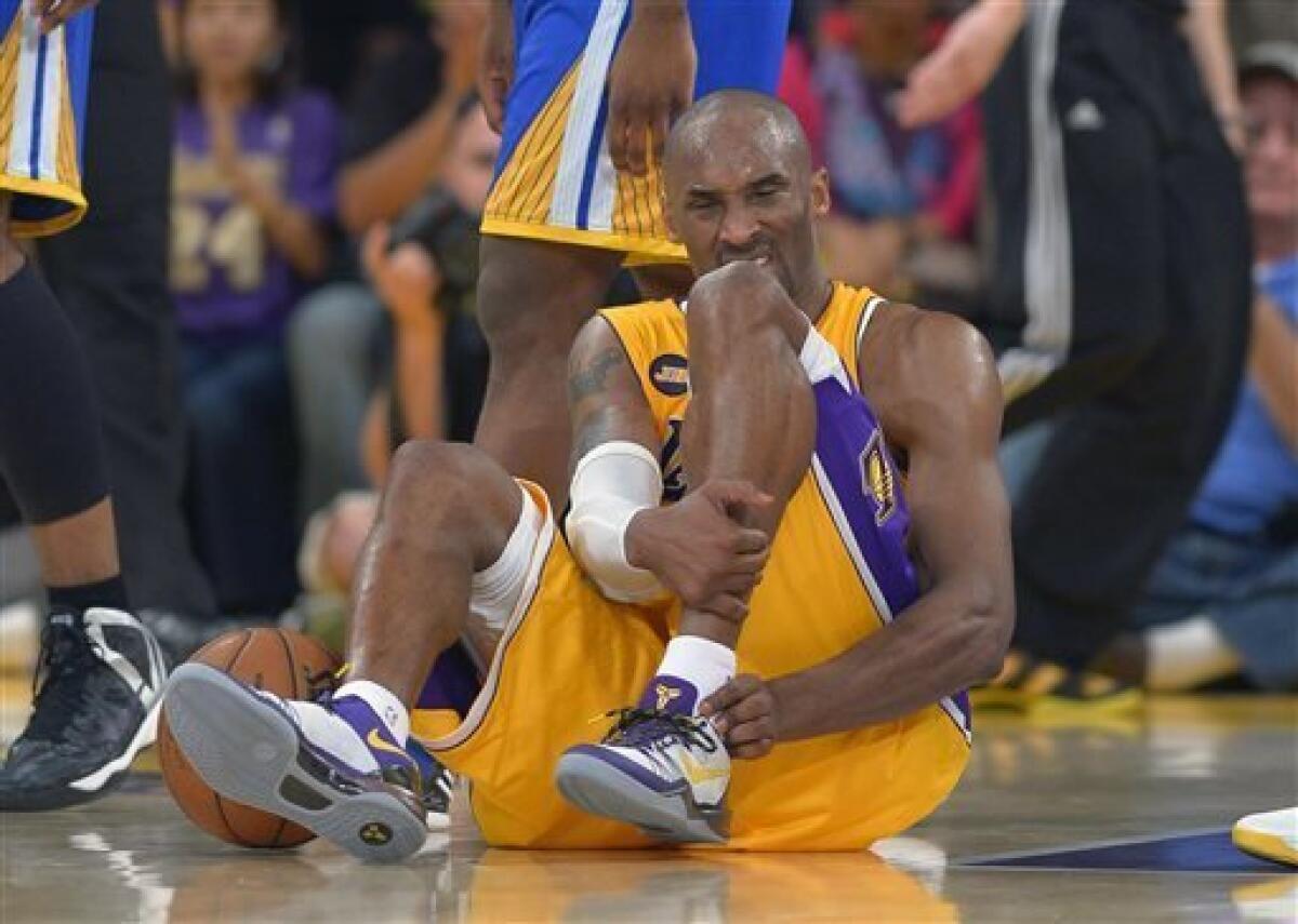 LA Lakers' Kobe Bryant misses second consecutive game with back