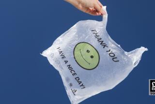 A Blue Transparent Plastic Bag Floating Stock Photo, Picture and