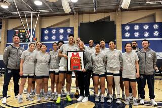 Juju Watkins gets presented her McDonald's All-American award before scoring 60 points on Tuesday night for Sierra Canyon.