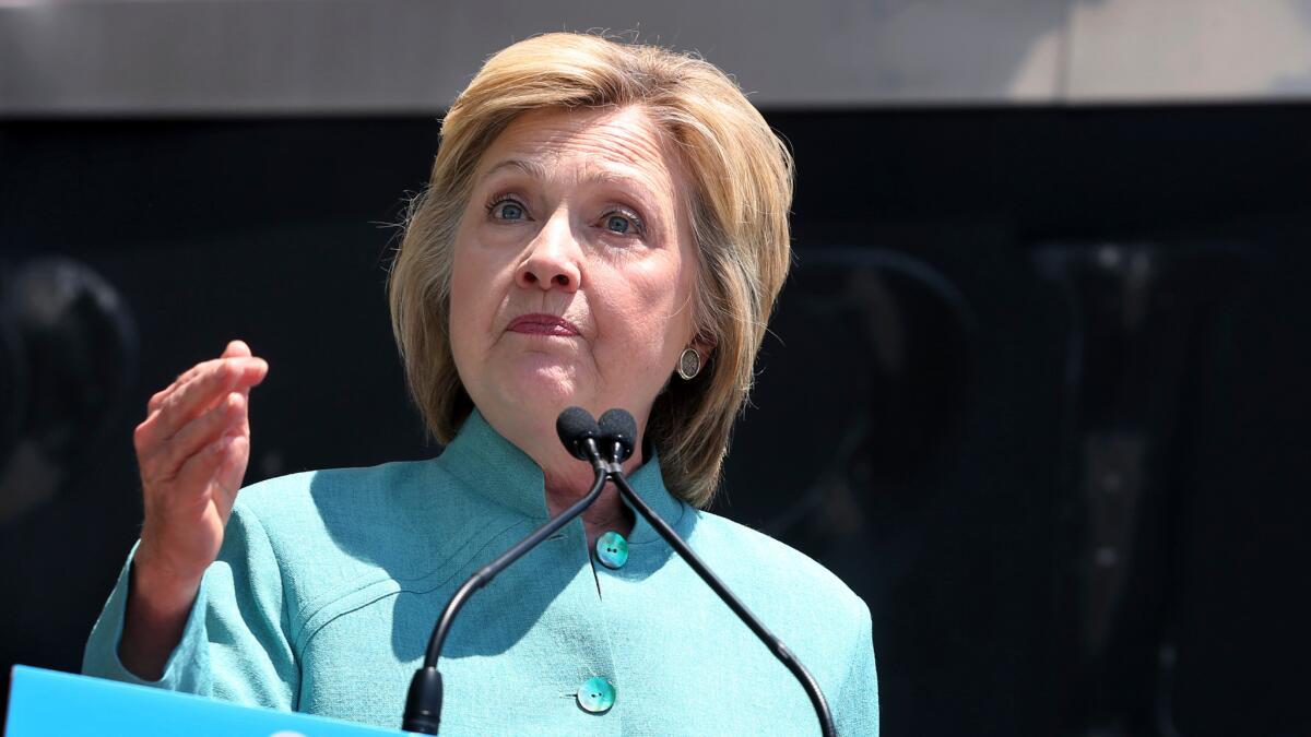 Democratic presidential candidate Hillary Clinton addresses a gathering on the boardwalk in Atlantic City, N.J.