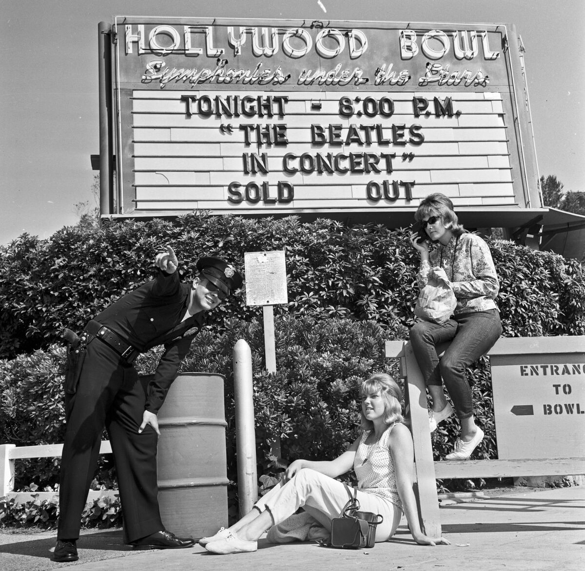 Fans await the arrival of the Beatles at the Hollywood Bowl for the concert on Aug. 23, 1964.