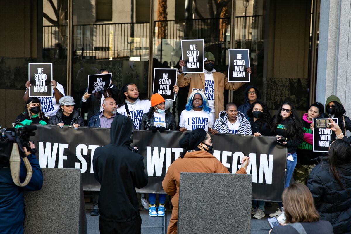 Supporters rally in support of Megan Thee Stallion outside of the courthouse in Los Angeles.