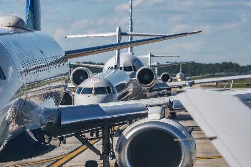 A busy airport tarmac traffic before airplanes take off