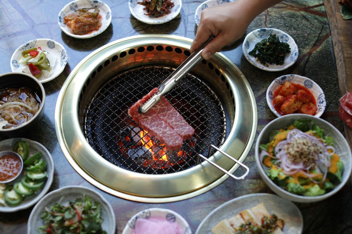 Boneless short rib on the grill at Jeong Yuk Jeom