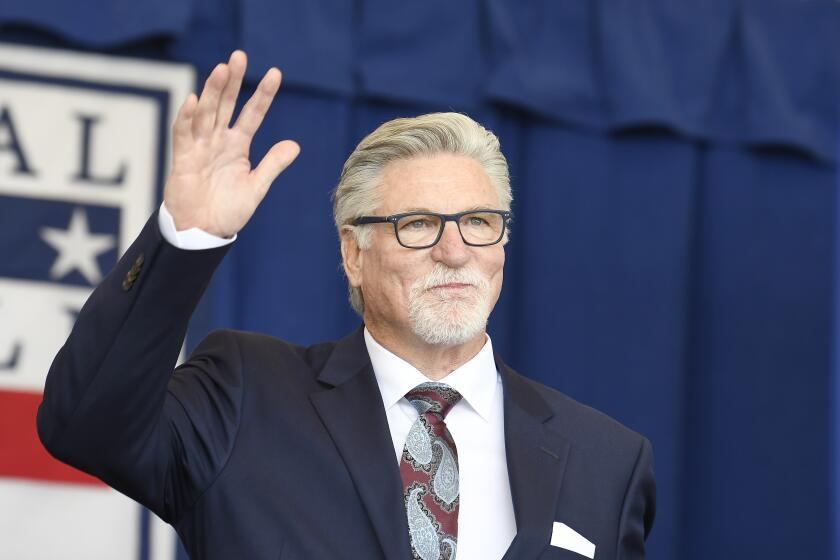 National Baseball Hall of Fame inductee Jack Morris waves as he is introduced during an induction ceremony