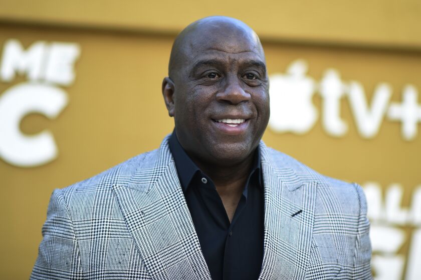 Magic Johnson arrives at the premiere of "They Call Me Magic" on Thursday, April 14, 2022