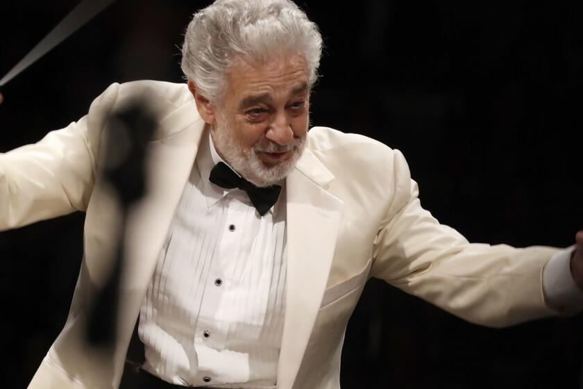 HOLLYWOOD, CALIF.. - SEP. 13, 2018. Placido Domingo conducts music from Spain with the Los Angeles Philharmonic Orchestra at the Hollywood Bowl on Thursday night, Sept. 13, 2018. (Luis Sinco/Los Angeles Times)