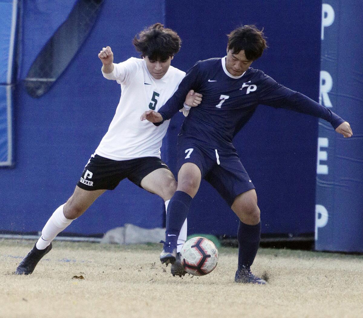 Providence's Arath Pedroza-Alberto battles Flintridge Prep's Eric Ahn for the ball in a Prep League boys' soccer game at Flintridge Preparatory School in La Canada Flintridge on Wednesday, January 29, 2020. Providence won the game 1-0 after scoring in the first half.