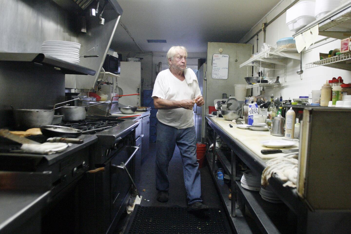 Head chef Michael Kidby works in the back kitchen at Riverside Cafe in Burbank on Wednesday, August 22, 2012.