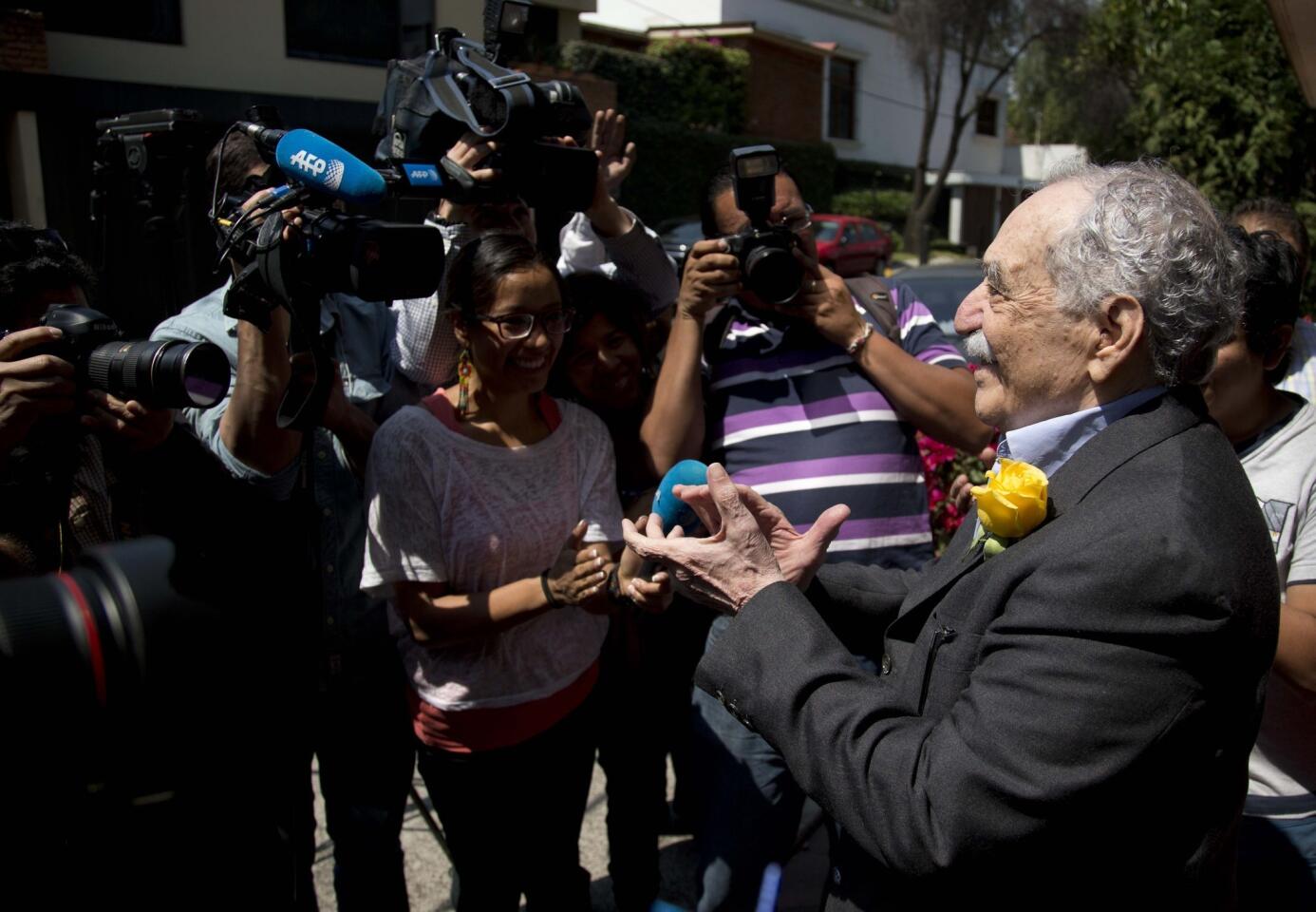 Colombian Nobel literature laureate Gabriel Garcia Marquez meets with fans and reporters outside his Mexico City home on March 6, his 87th birthday.