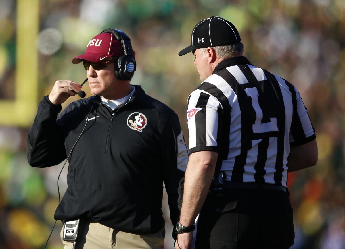 Florida State Coach Jimbo Fisher talks with an official during the College Football Playoff semifinal game at the Rose Bowl on Jan. 1.