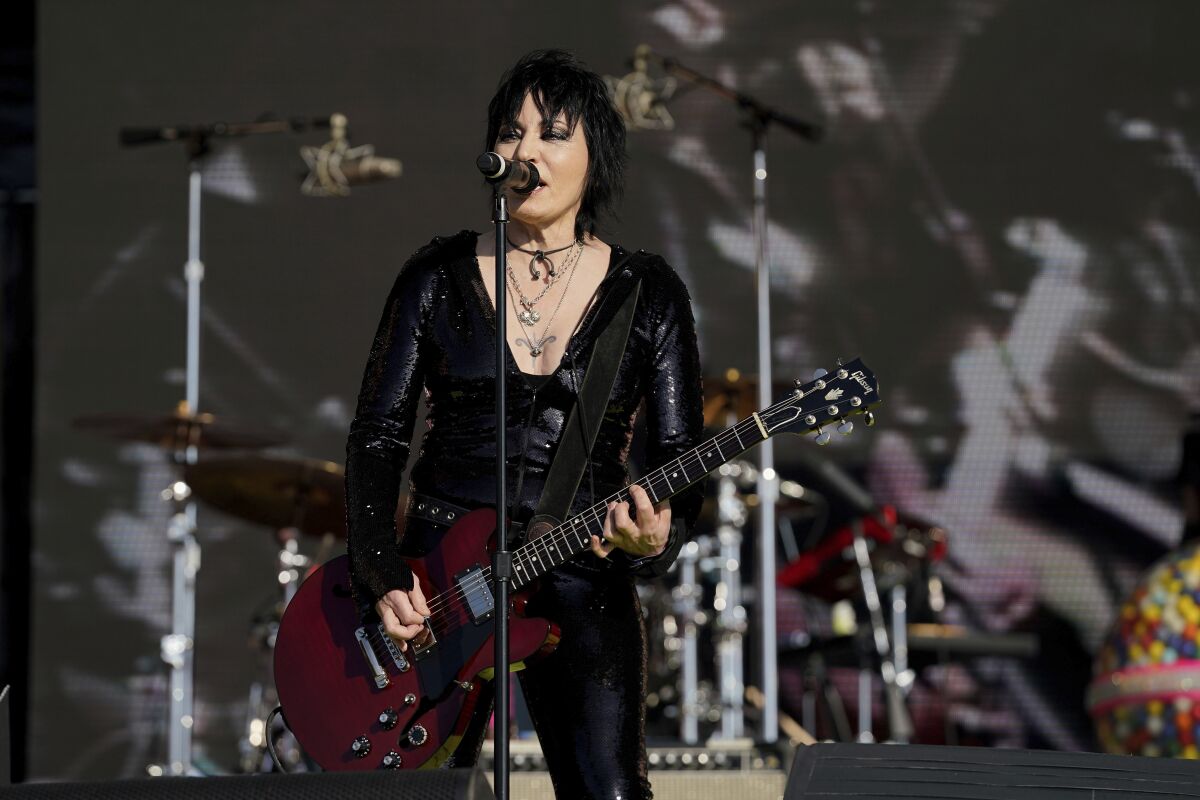 Joan Jett performs with Miley Cyrus at the TikTok Tailgate concert in 2021.