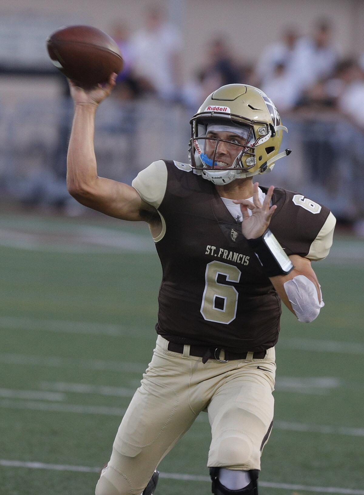 St. Francis' quarterback Jack Clougherty passes downfield against Mira Costa in the season home opener non-league football game at St. Francis on Friedman Field on Friday, August 30, 2019.