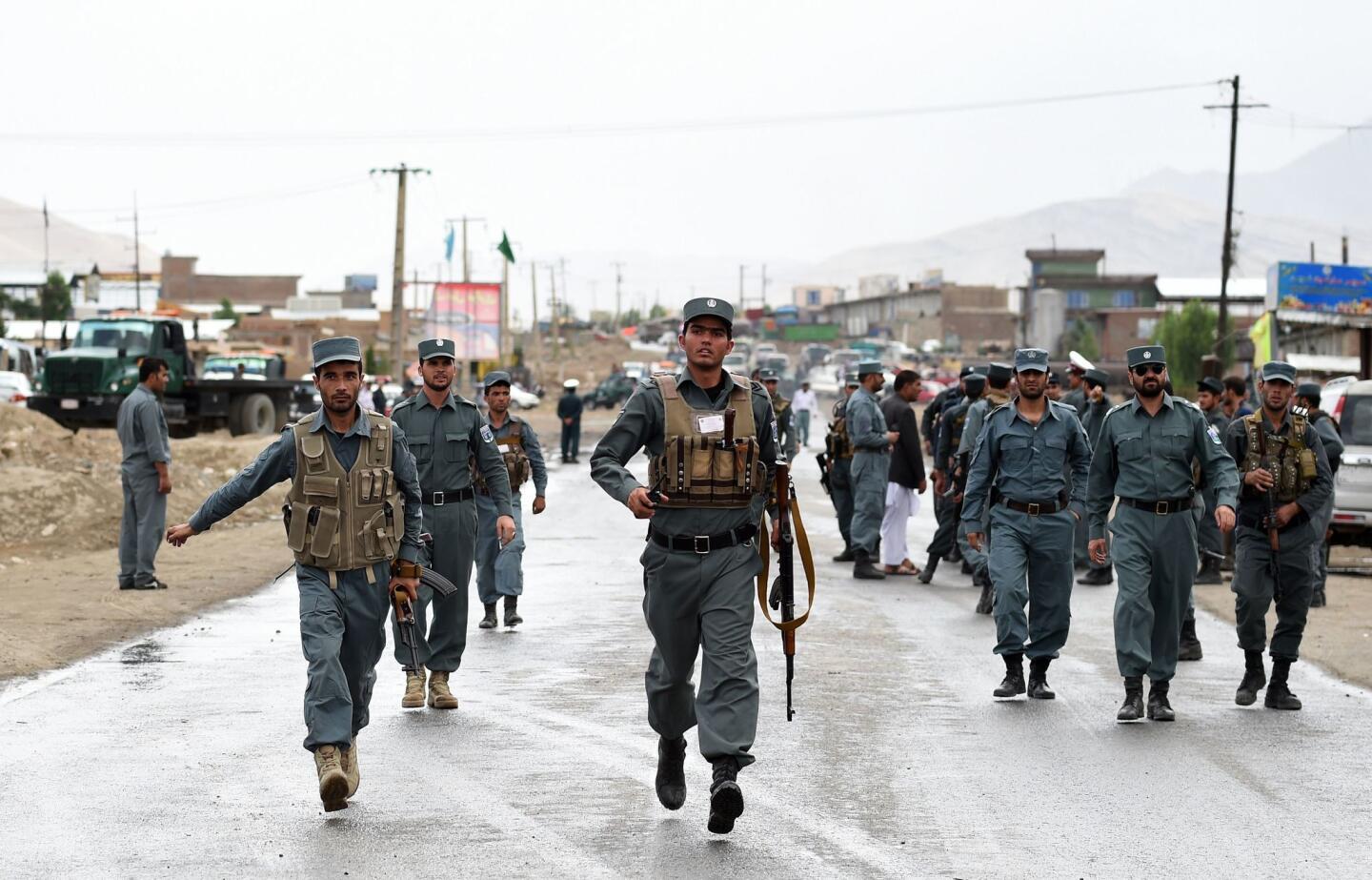 Taliban suicide bombers attack buses filled with police cadets in Kabul