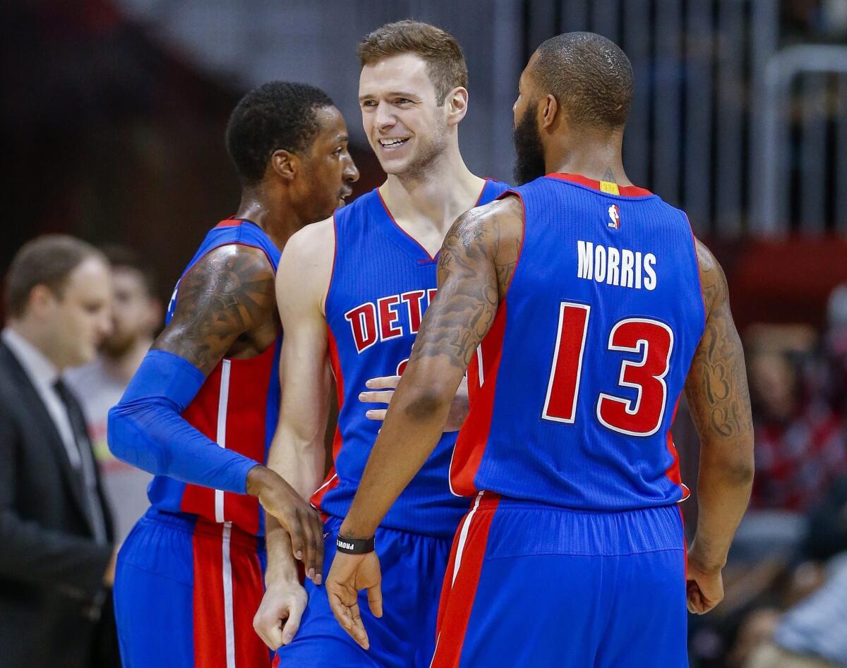 Detroit Pistons players, forward Jon Leuer (C) reacts with forward Marcus Morris and guard Kentavious Caldwell-Pope (L) during the second half of their NBA basketball game against the Atlanta Hawks at Philips Arena in Atlanta, Georgia, USA, 02 December 2016. The Pistons defeated the Hawks. (