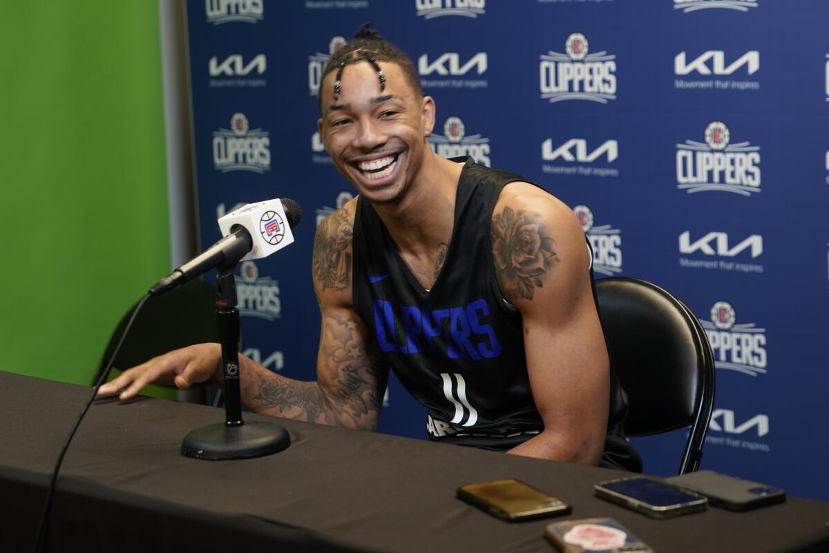 Jordan Miller breaks into a smile while addressing the media Saturday at the Clippers' training facility in Playa Vista.