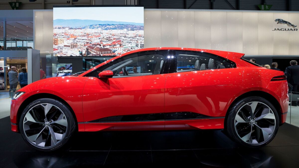 The all-electric Jaguar I-Pace is headed for dealer showrooms in 2018. Theoretically, it will compete against the Tesla Model Y crossover, which Musk has Twitter-teased but not yet announced. (Cyril Zingaro / AP)