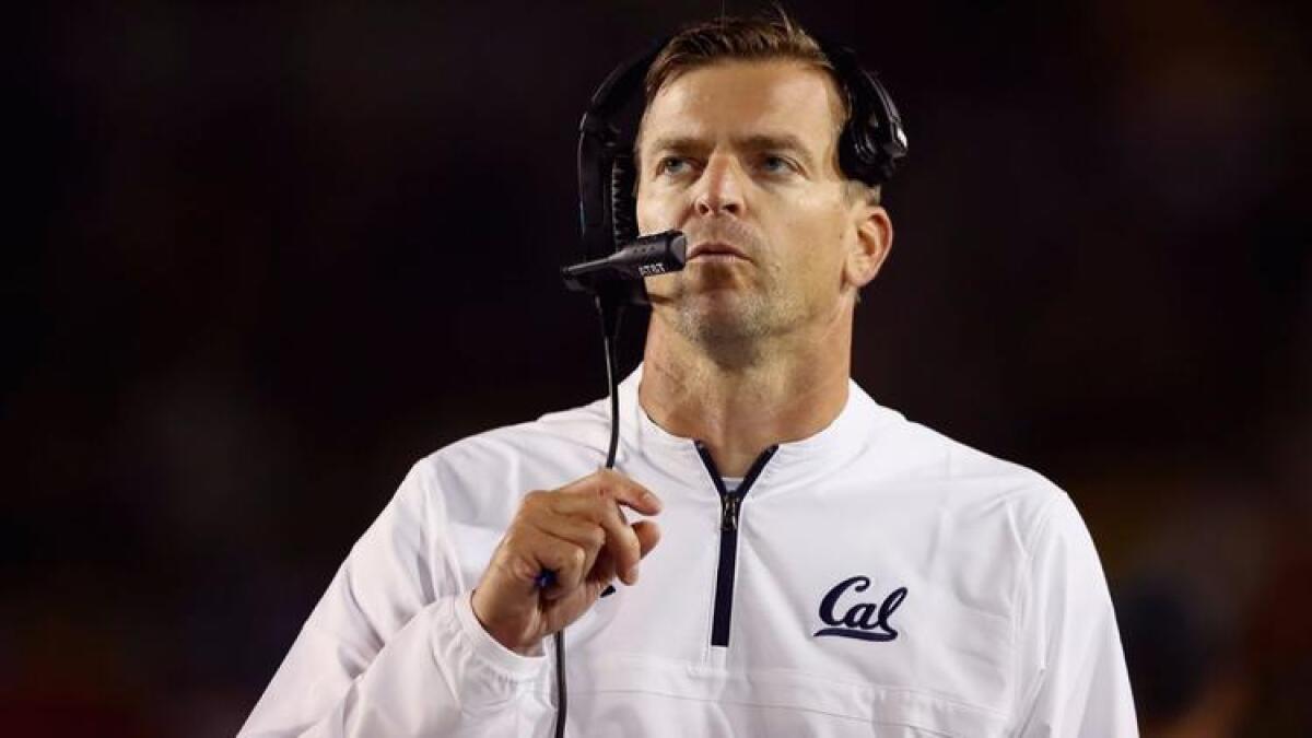 Cal coach Justin Wilcox stands on the sidelines during the Bears' game against Mississippi.