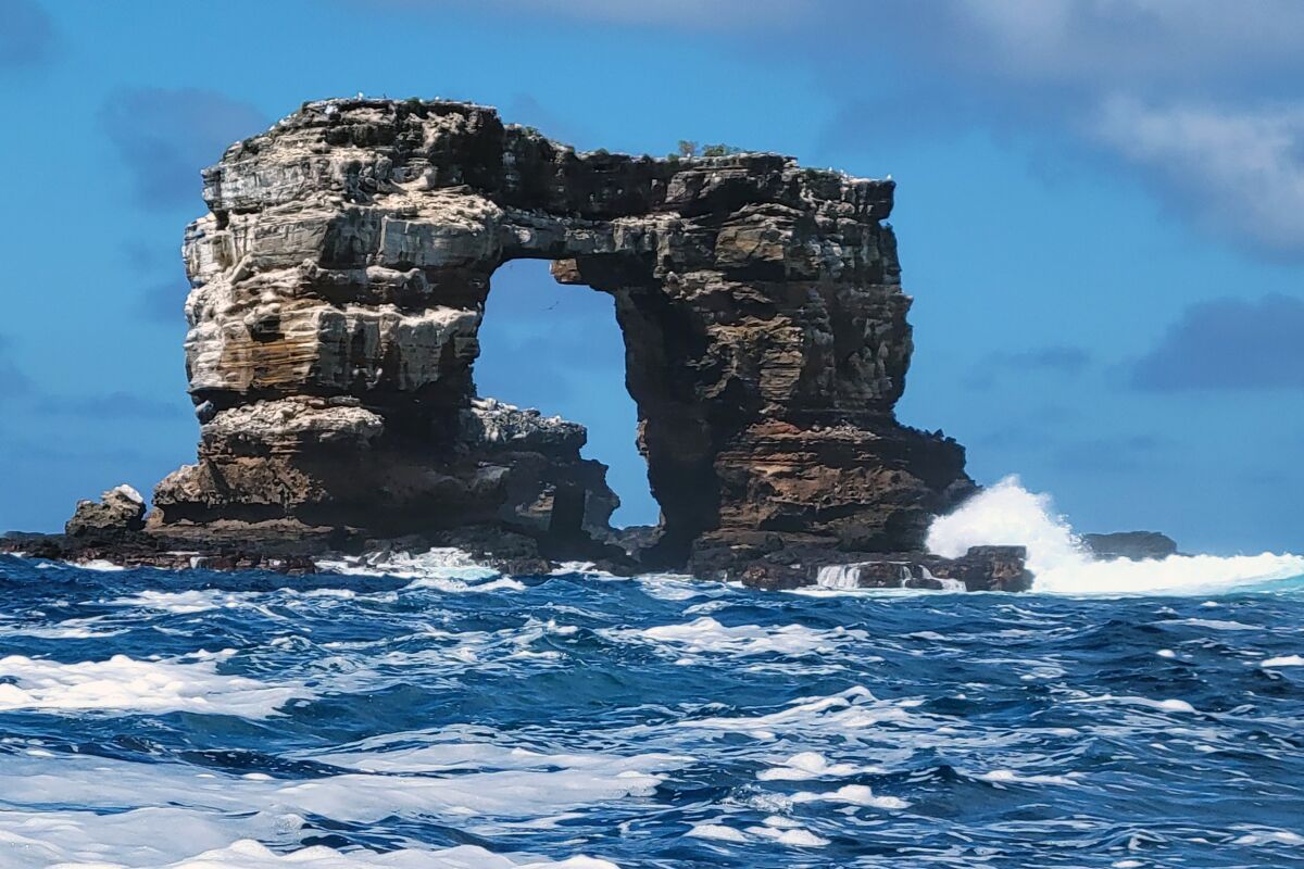 This photo distributed by Galapagos National Park shows Darwin's Arch off the Galapagos Islands, Ecuador, Sunday.