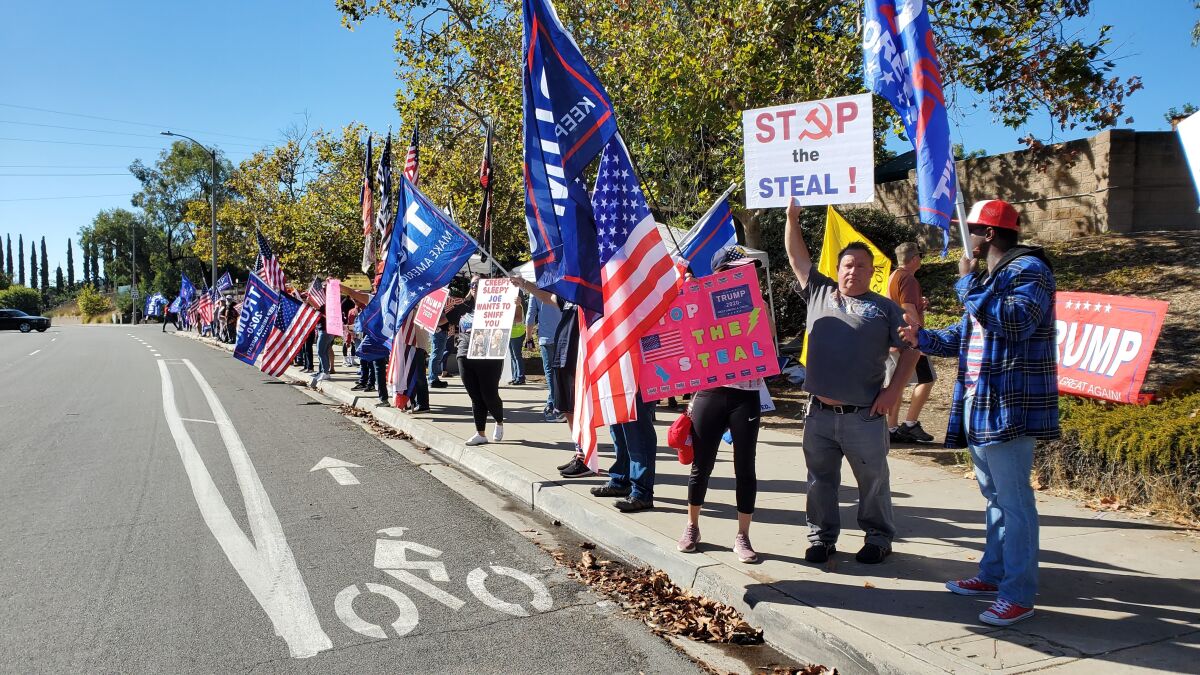 Trump supporters rallied in Poway on Nov. 15 in support of President Donald Trump's false claims of election fraud. 