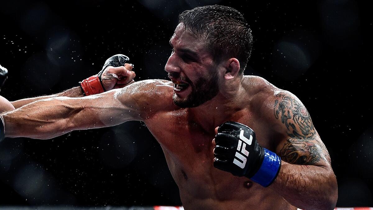 Chad Mendes fights Jose Aldo during a featherweight championship bout at UFC 179 in Brazil on Oct. 25, 2014. Mendes defeated Ricardo Lamas on Saturday.