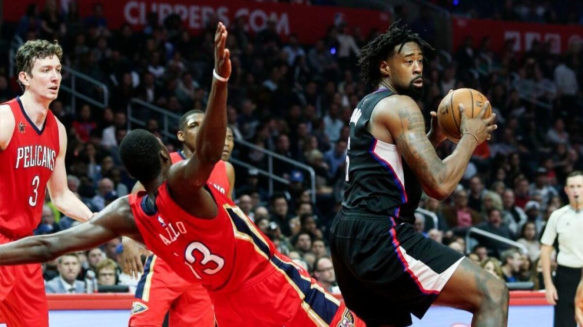 Clippers big man DeAndre Jordan works against Pelicans forward Cheick Diallo during the first half of a game on Dec. 10.