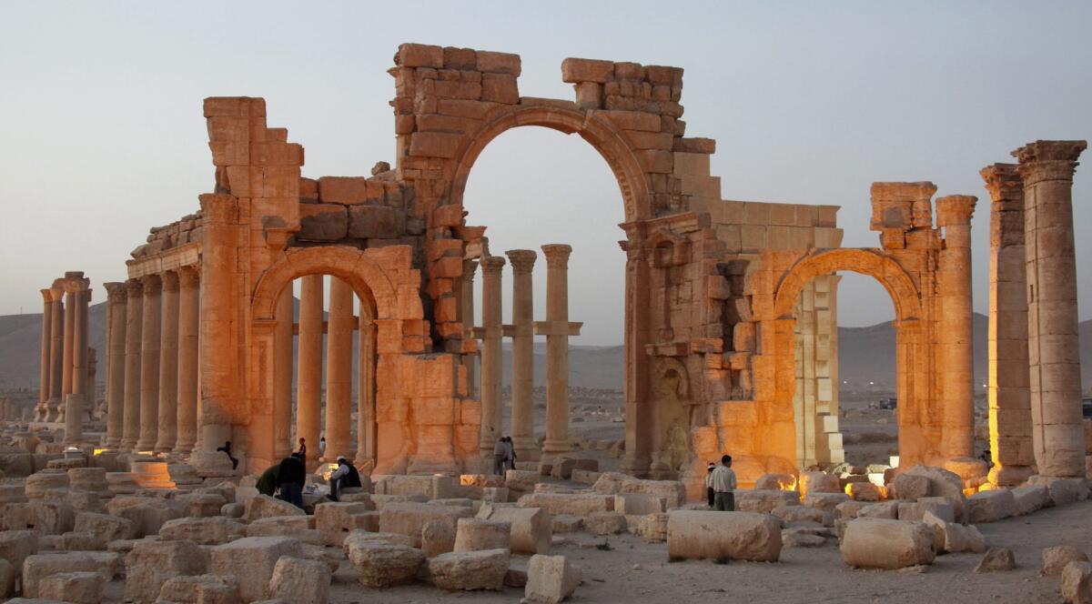 Islamic State militants have blown up Palmyra's ancient Arch of Triumph, pictured, according to Syrian activists.