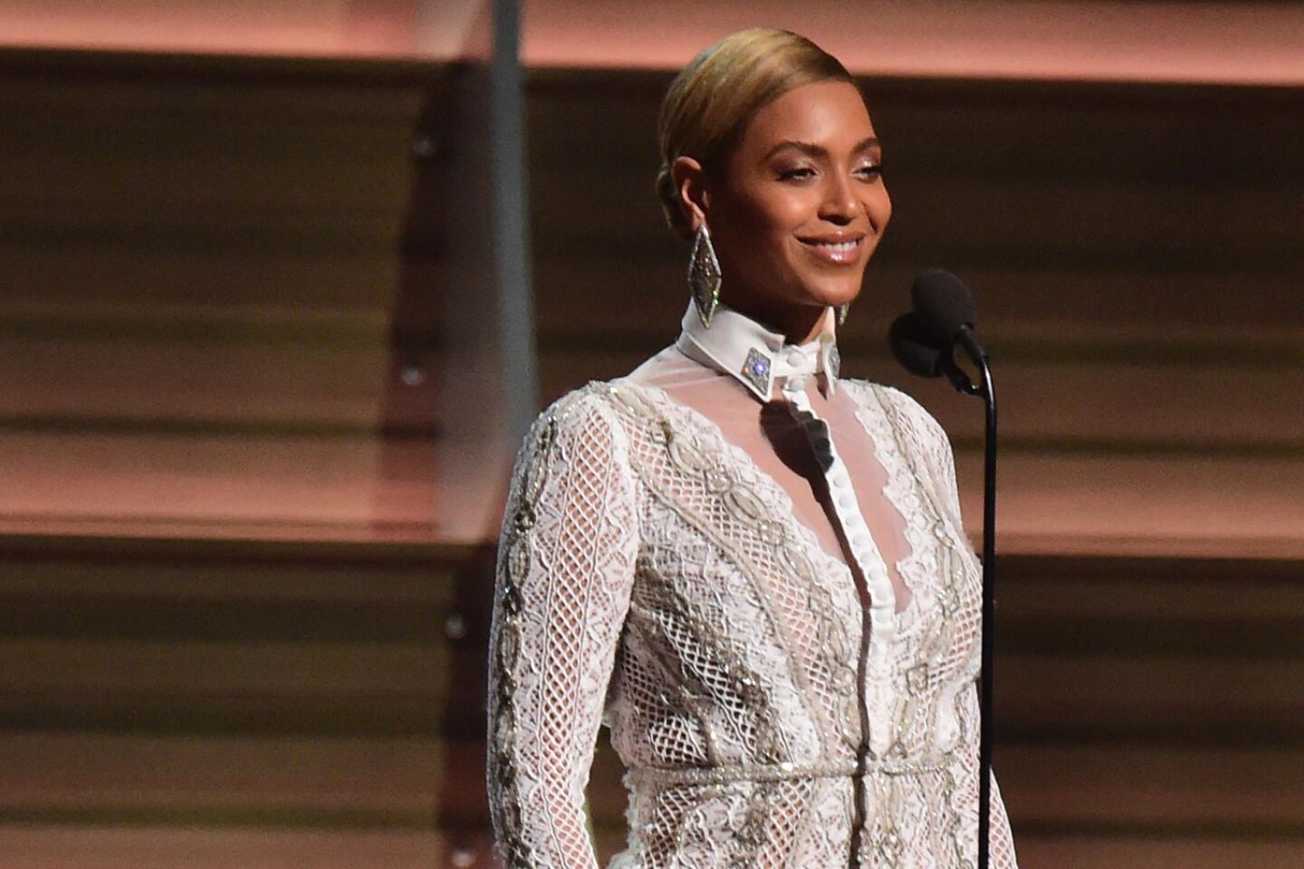 Beyonce presents the final award of the night, record of the year.