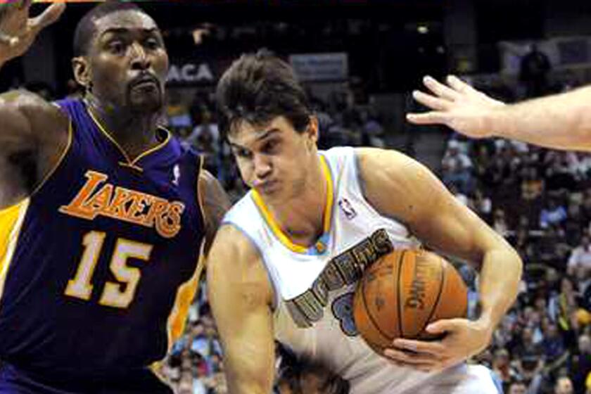Danilo Gallinari, driving to the basket against Lakers forward Metta World Peace, is coming off his two best scoring seasons when he averaged 18.2 and 19.5 points a game.