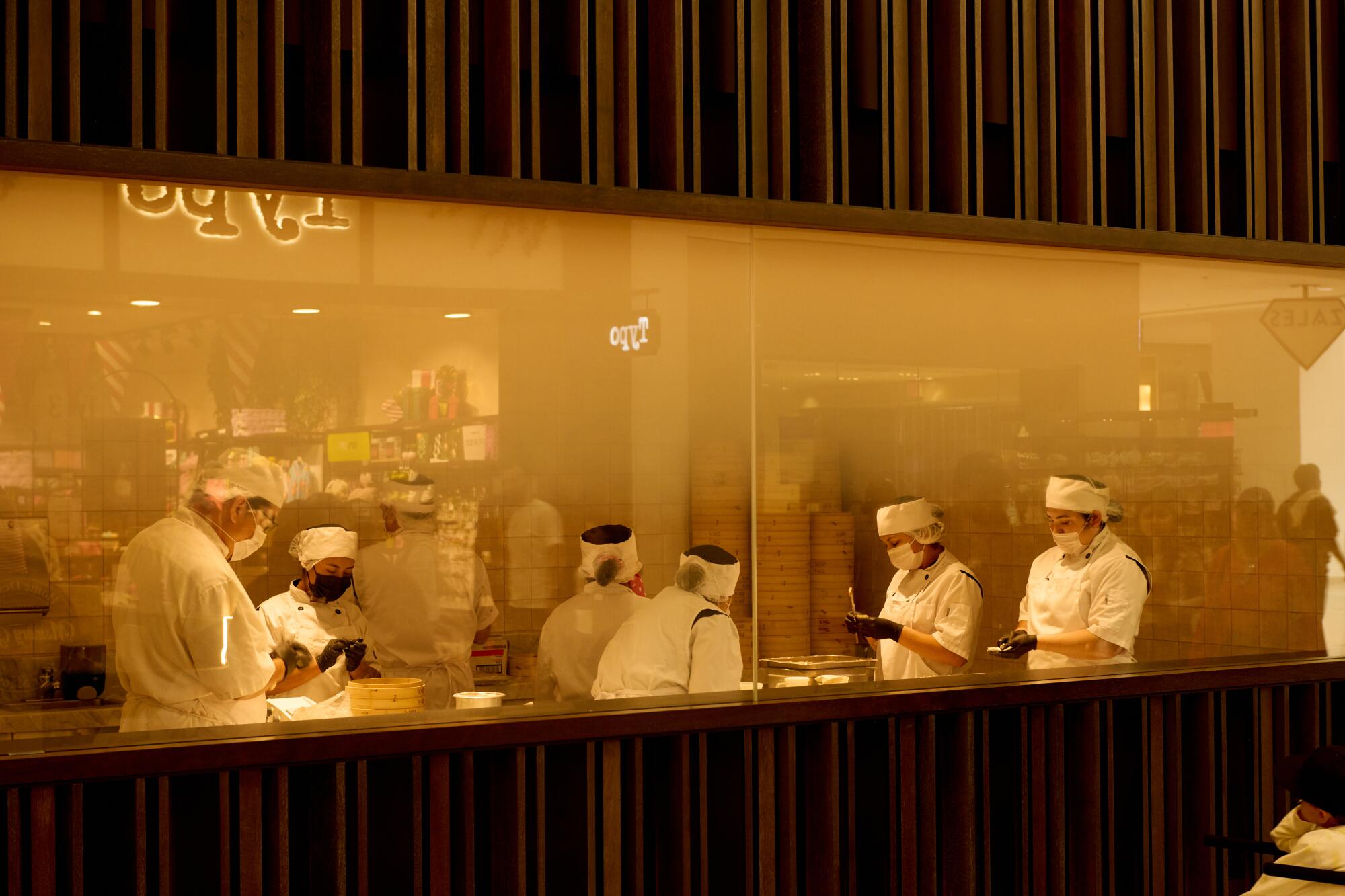 Xiao long bao being made from the display room at Din Tai Fung.