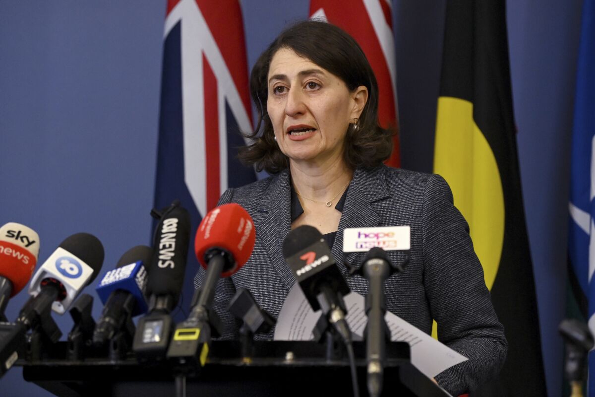 New South Wales Premier Gladys Berejiklian announces her resignation in Sydney, Friday, Oct. 1, 2021. The leader of Australia's most populous state quit as premier after an anti-corruption watchdog revealed it was investigating her over a secret relationship with a former lawmaker. (Bianca De Marchi/AAP Image via AP)