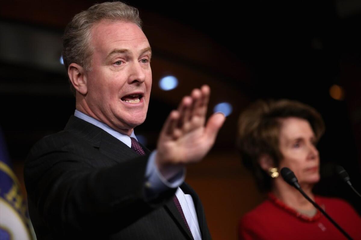 Rep. Chris Van Hollen (D-Md.), the top Democrat on the House Budget Committee, and House Minority Leader Nancy Pelosi (D-San Francisco) answer reporters' questions about looming budget cuts during her weekly news conference at the U.S. Capitol on Thursday.